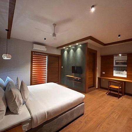 ホテル Cmk Habitat Centre Kochi エクステリア 写真