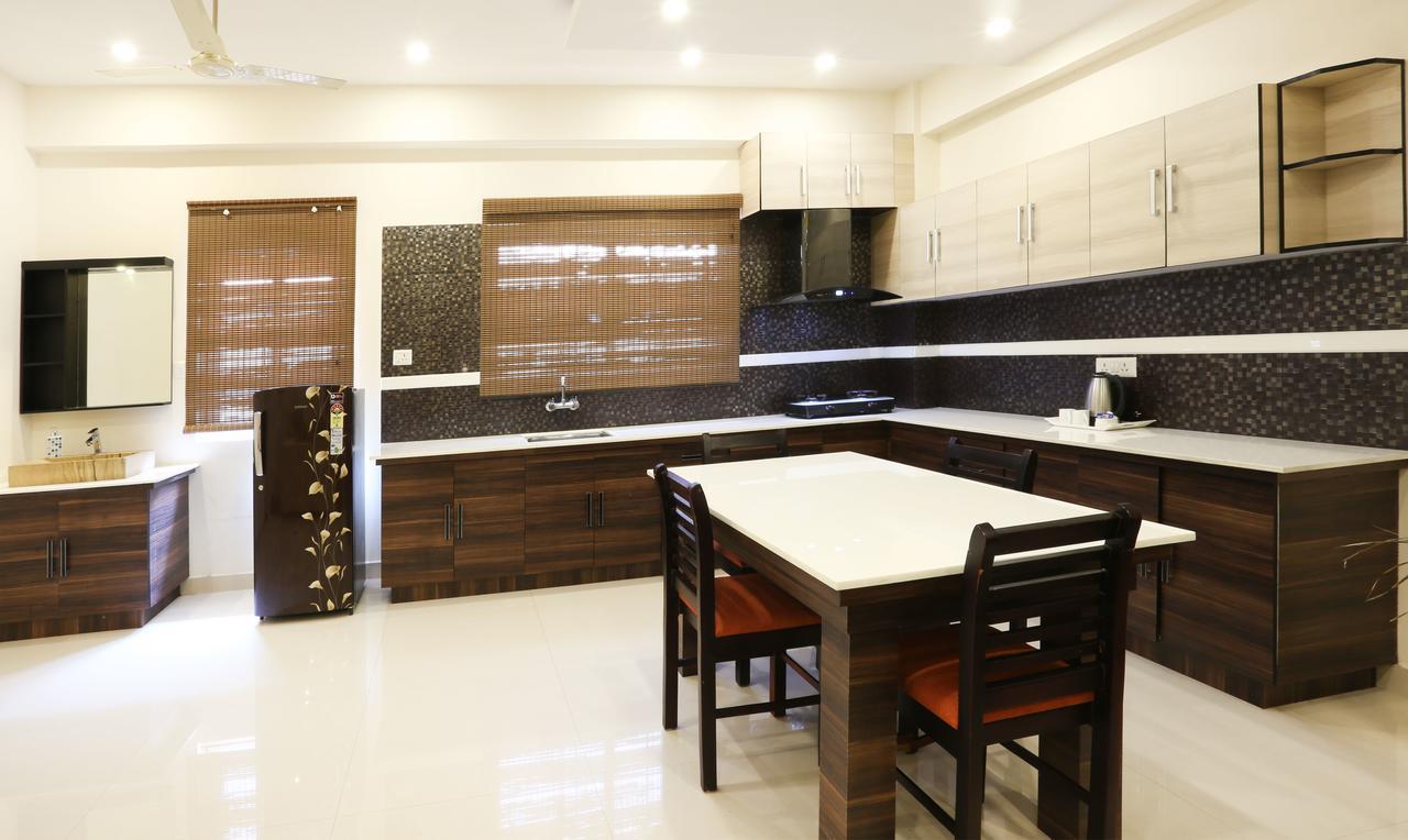 ホテル Cmk Habitat Centre Kochi エクステリア 写真